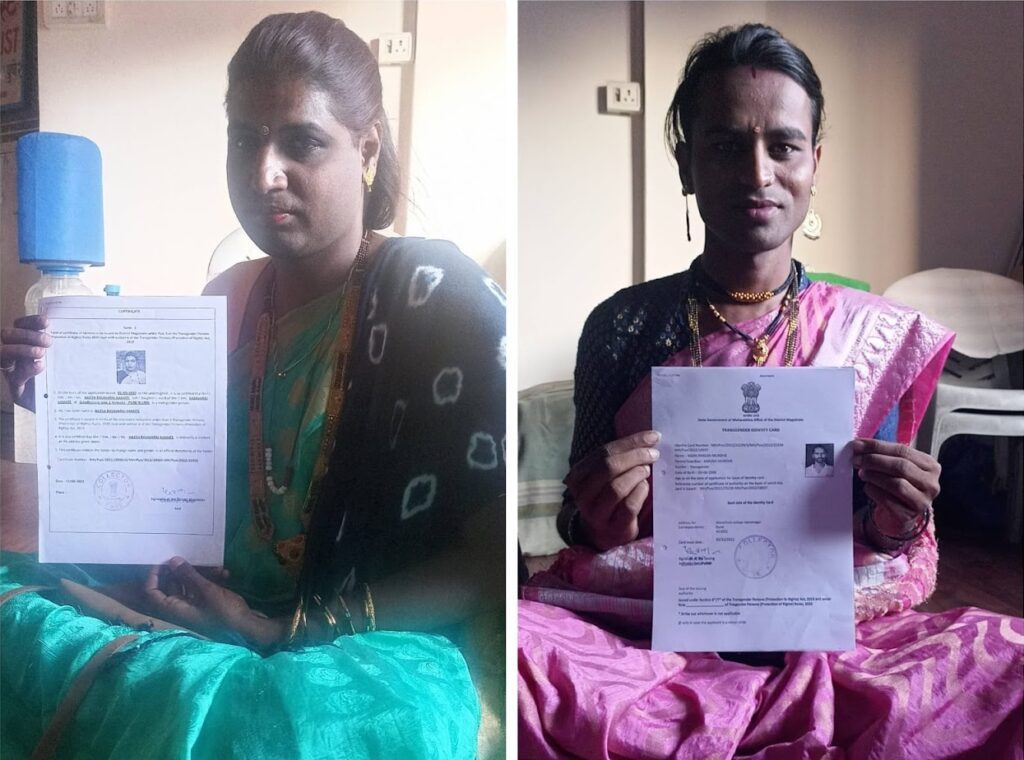 Transwomen holding up their transgender certificate